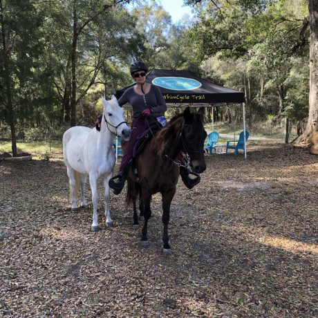 woman with 2 horses